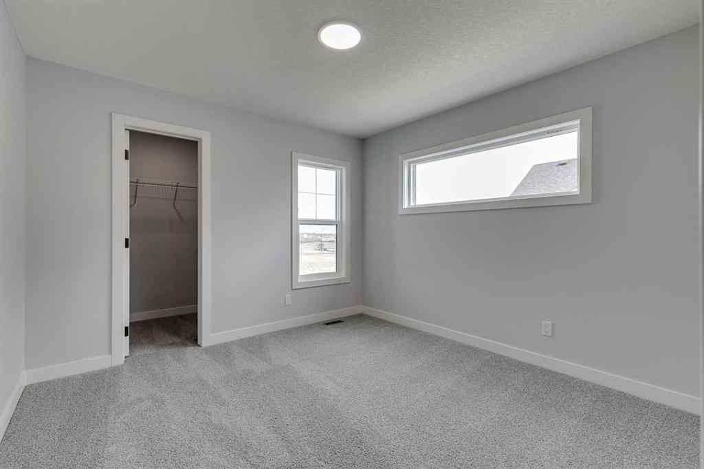 MLS® A2268823 - 31 Creekstone Green SW in Pine Creek Calgary, Residential
