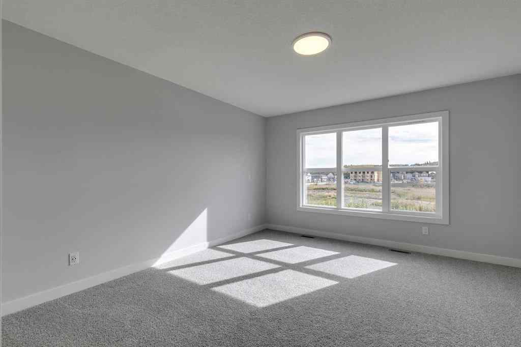 MLS® A2268823 - 31 Creekstone Green SW in Pine Creek Calgary, Residential