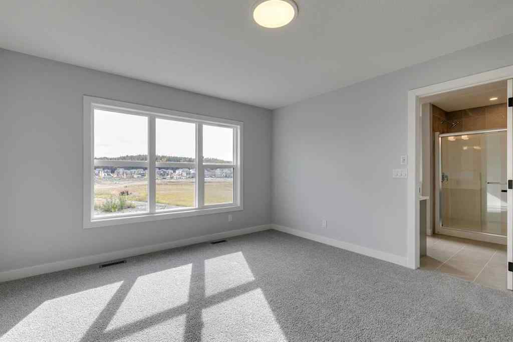 MLS® A2268823 - 31 Creekstone Green SW in Pine Creek Calgary, Residential