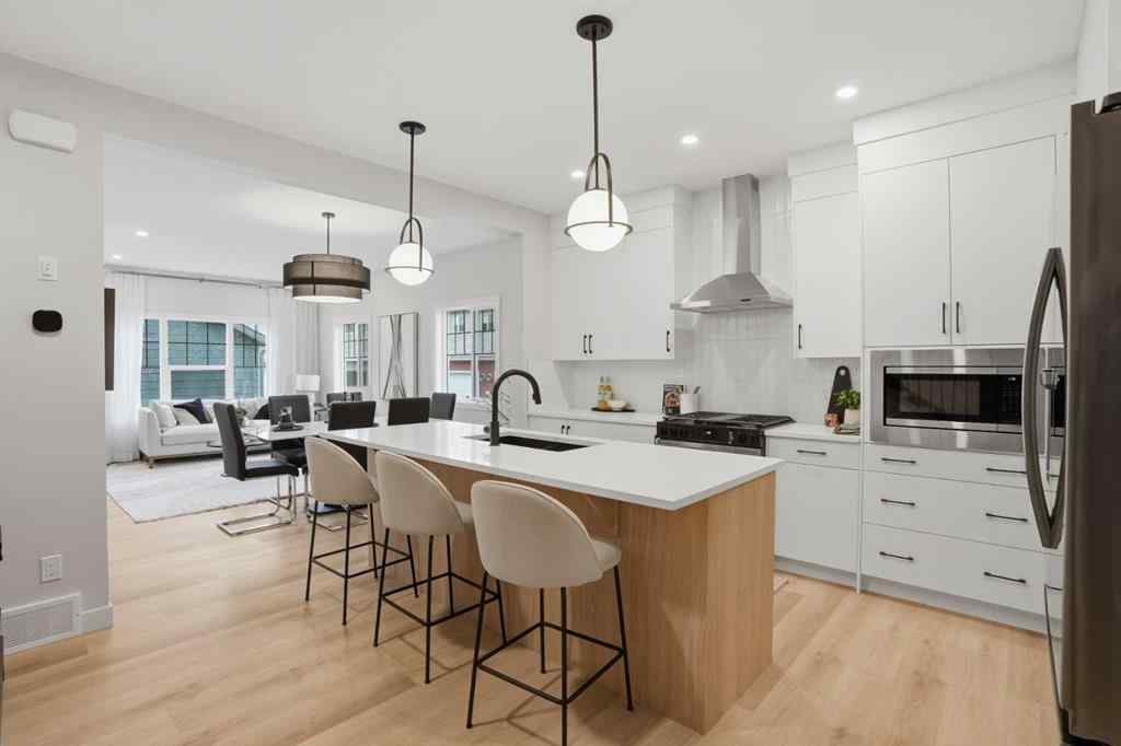 MLS&reg; # A2268824 - 64 Buffaloberry Manor SE in Ricardo Ranch Calgary, Residential Open Houses