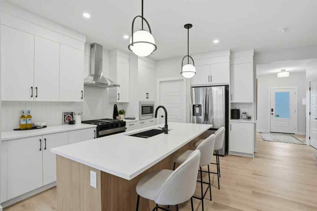 MLS&reg; # A2268824 - 64 Buffaloberry Manor SE in Ricardo Ranch Calgary, Residential Open Houses