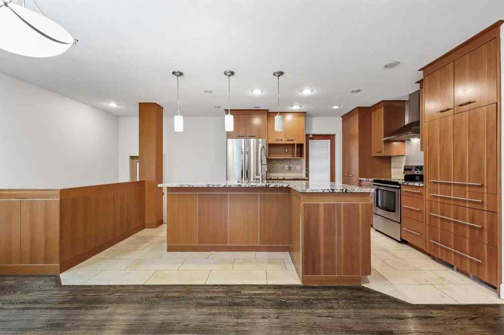 MLS® # A2268837 - 303 40 Street SW in Wildwood Calgary, Residential Open Houses