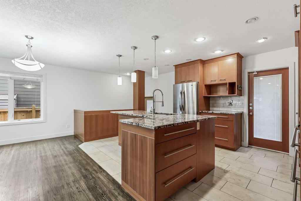 MLS® # A2268837 - 303 40 Street SW in Wildwood Calgary, Residential Open Houses