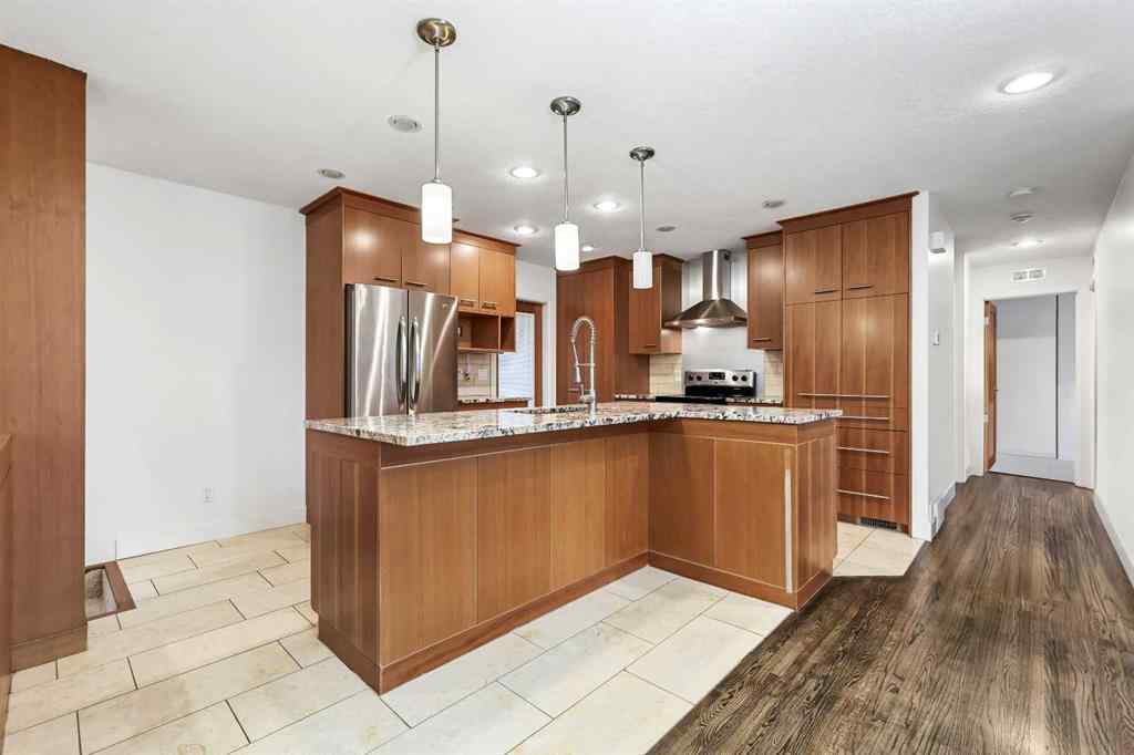 MLS® # A2268837 - 303 40 Street SW in Wildwood Calgary, Residential Open Houses