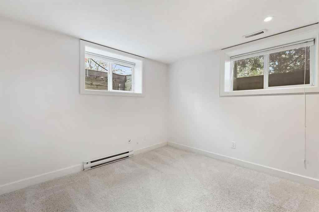 MLS® # A2268837 - 303 40 Street SW in Wildwood Calgary, Residential Open Houses