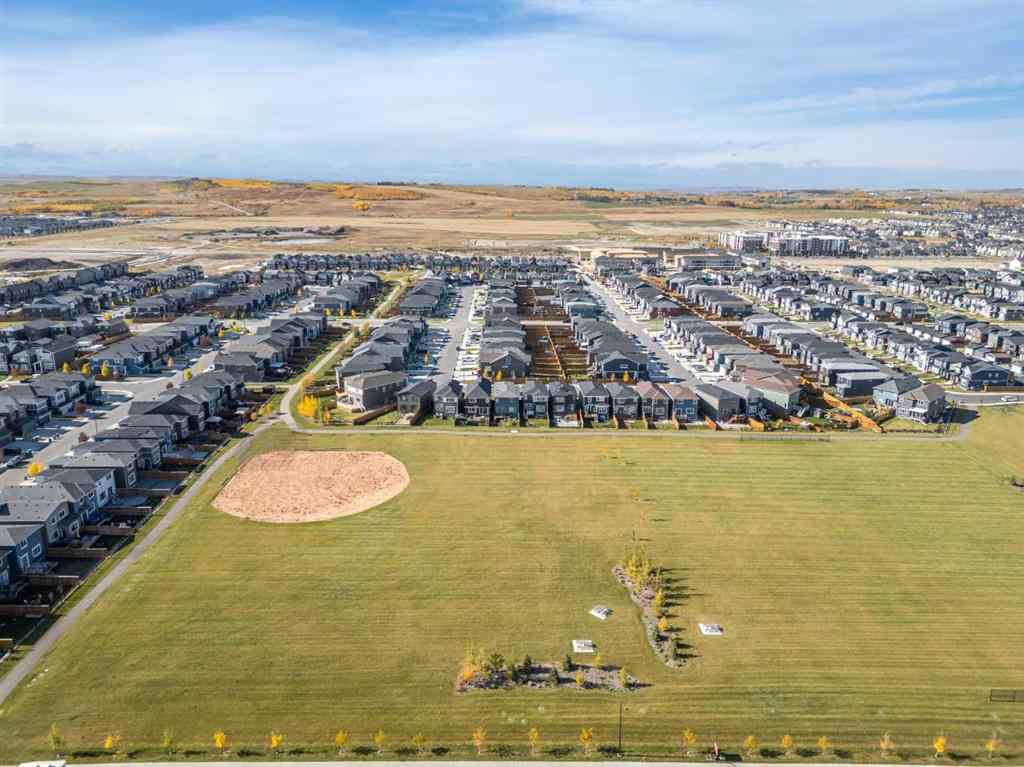 MLS&reg; # A2268842 - 63 Creekstone Common SW in Pine Creek Calgary, Residential Open Houses