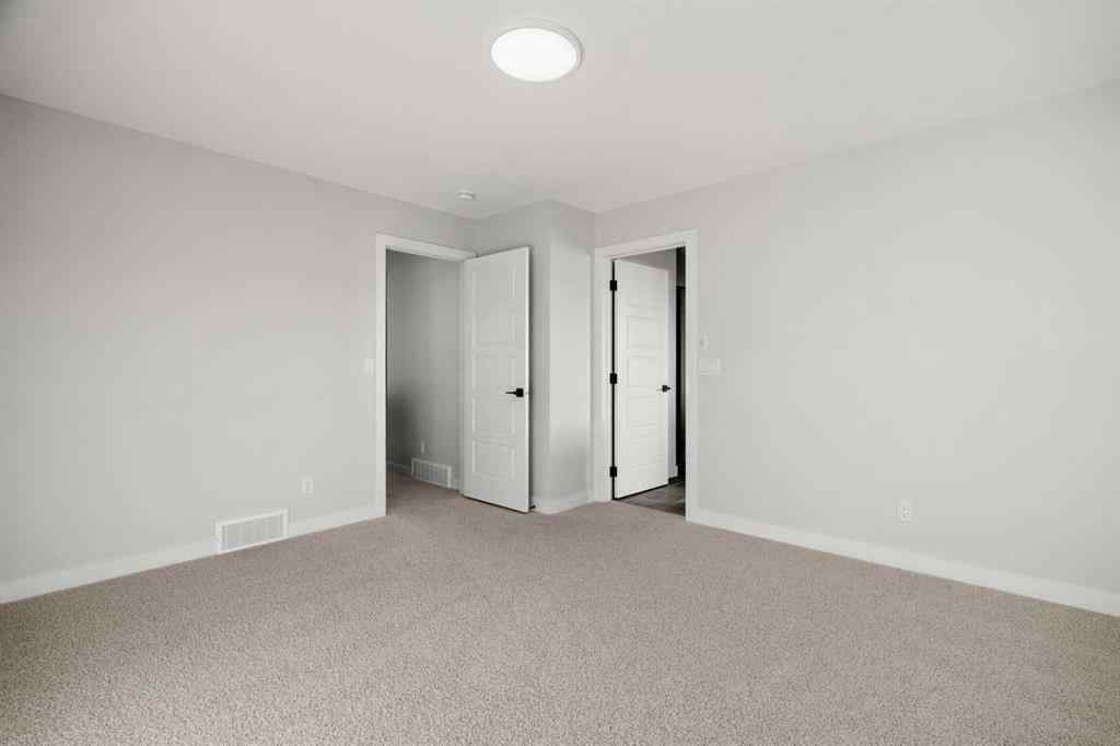 MLS&reg; # A2268842 - 63 Creekstone Common SW in Pine Creek Calgary, Residential Open Houses