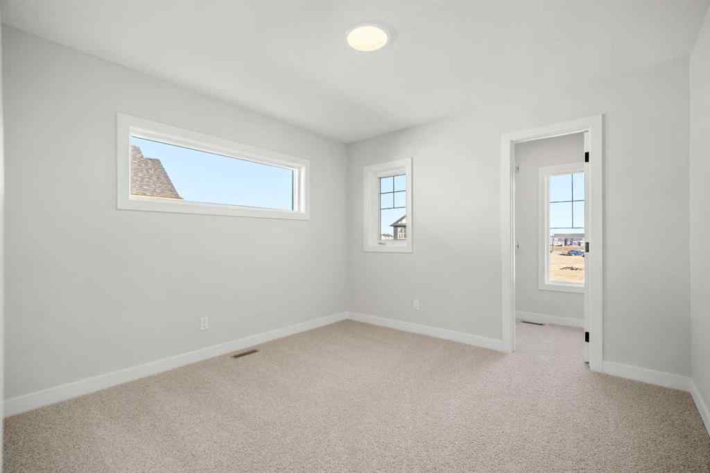 MLS&reg; # A2268842 - 63 Creekstone Common SW in Pine Creek Calgary, Residential Open Houses