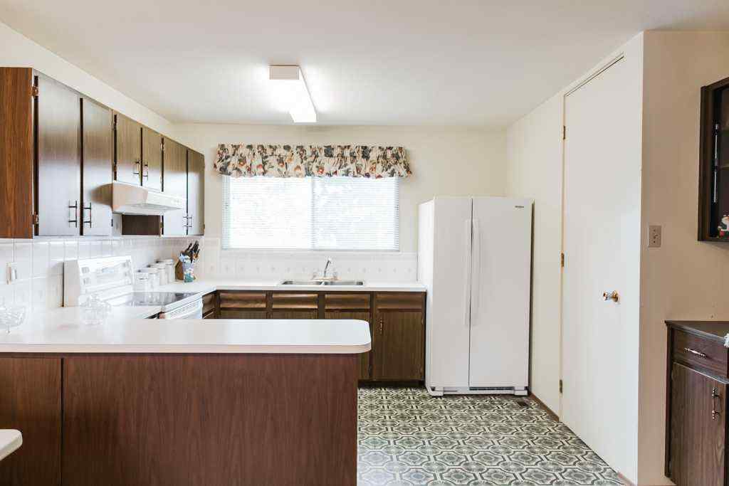 MLS® A2268851 - 9836 81 Avenue  in Patterson Place Grande Prairie, Residential