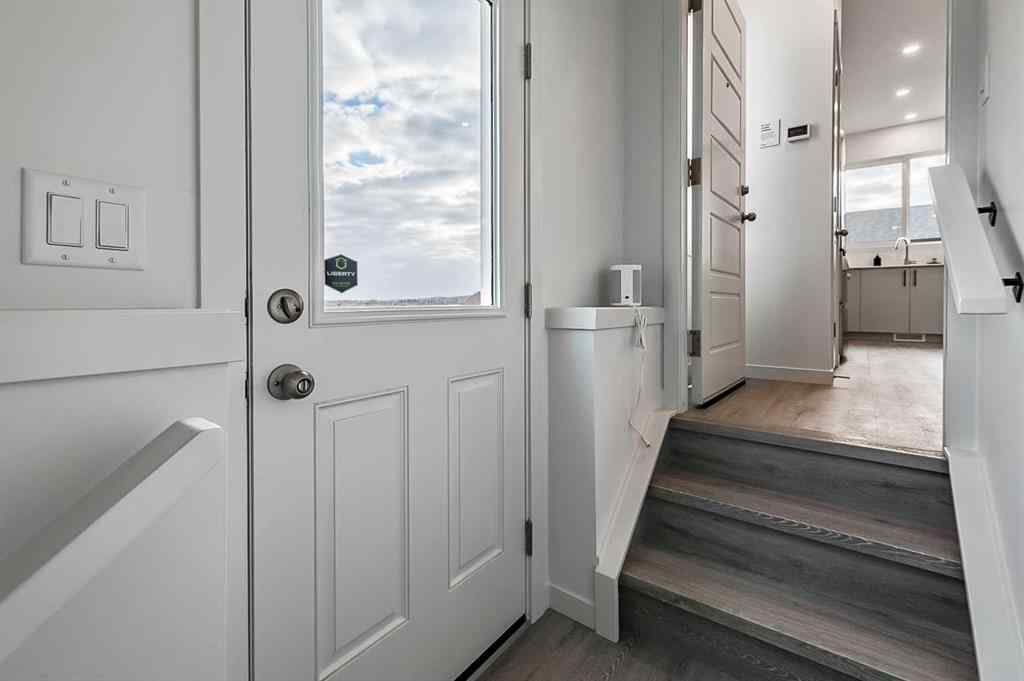 MLS&reg; # A2268874 - 918 Creekside Boulevard SW in Pine Creek Calgary, Residential Open Houses