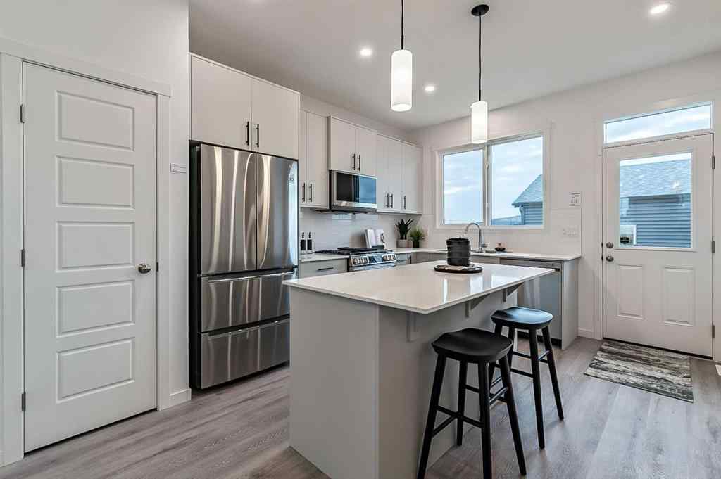MLS&reg; # A2268874 - 918 Creekside Boulevard SW in Pine Creek Calgary, Residential Open Houses