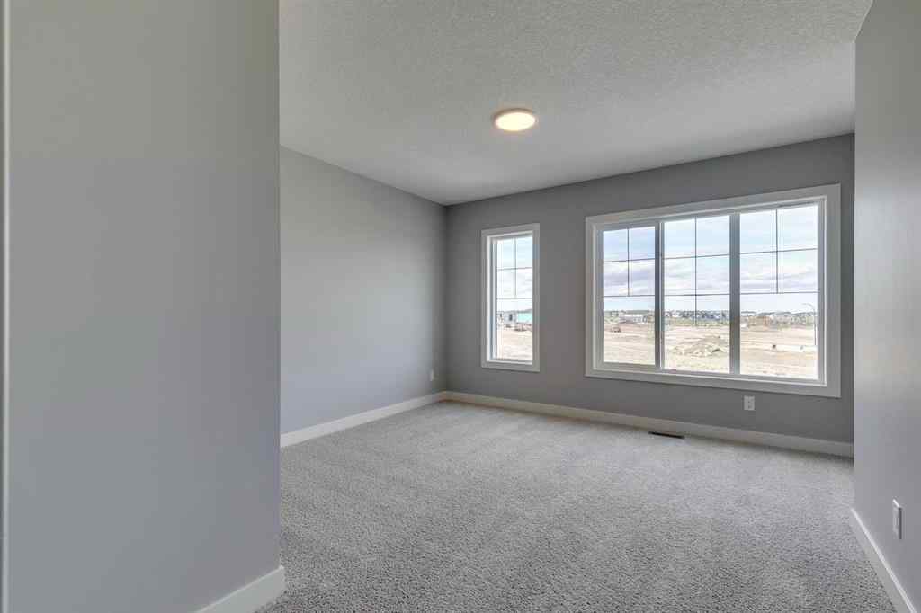 MLS® A2268878 - 23 Creekstone Green SW in Pine Creek Calgary, Residential