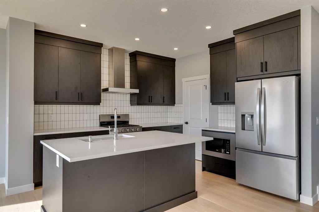 MLS® A2268878 - 23 Creekstone Green SW in Pine Creek Calgary, Residential