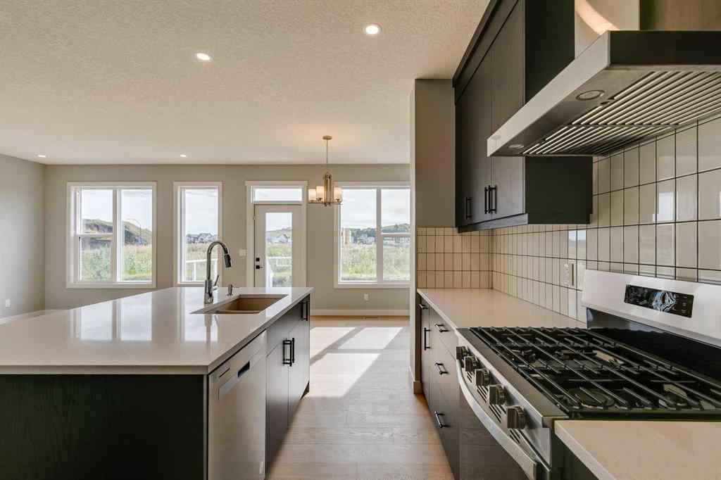 MLS® A2268878 - 23 Creekstone Green SW in Pine Creek Calgary, Residential