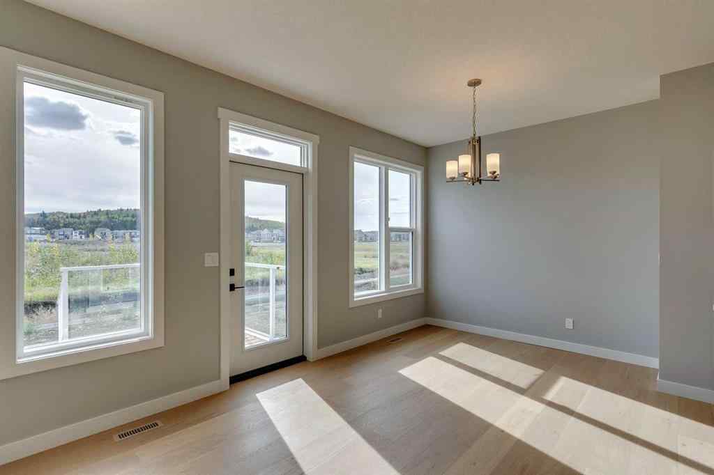 MLS® A2268878 - 23 Creekstone Green SW in Pine Creek Calgary, Residential