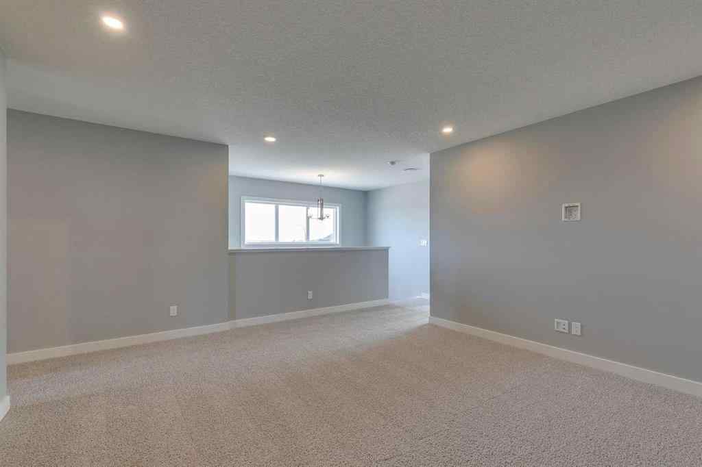 MLS® A2268878 - 23 Creekstone Green SW in Pine Creek Calgary, Residential