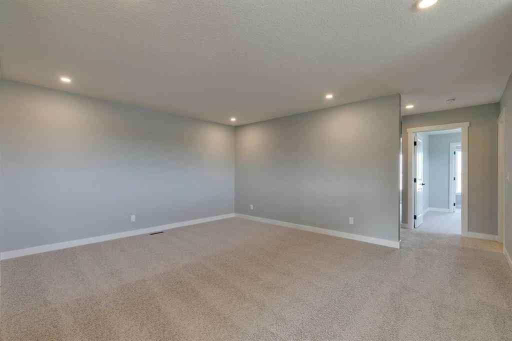 MLS® A2268878 - 23 Creekstone Green SW in Pine Creek Calgary, Residential