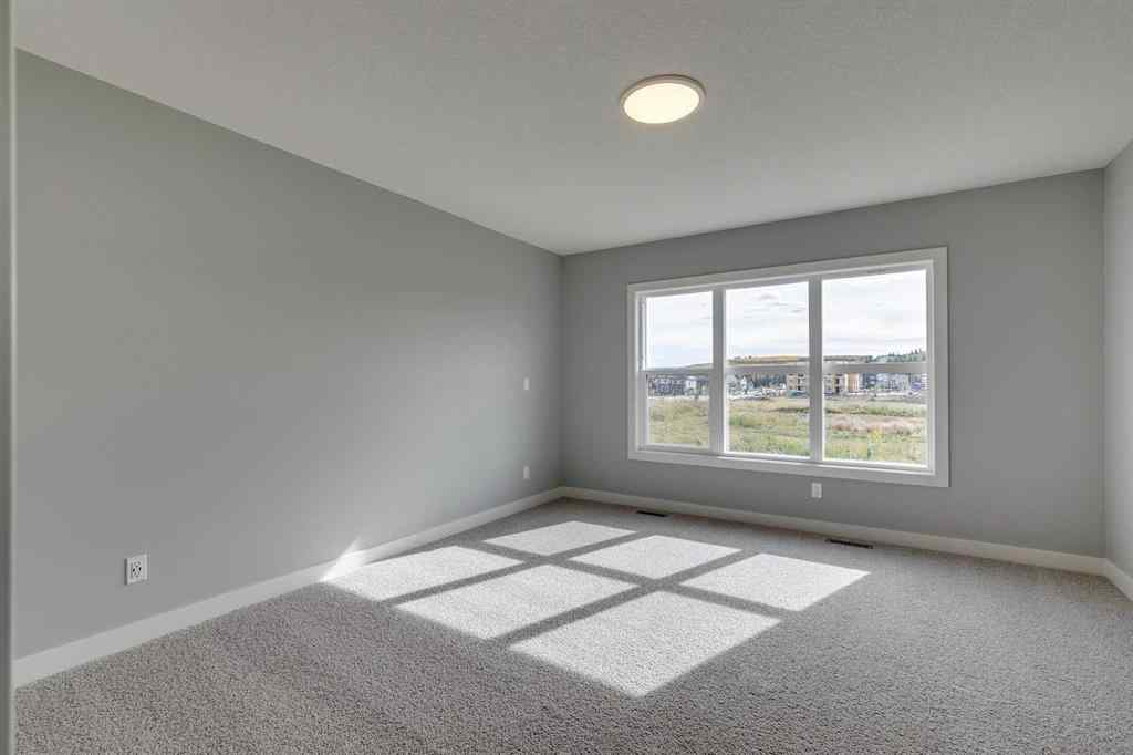 MLS® A2268878 - 23 Creekstone Green SW in Pine Creek Calgary, Residential