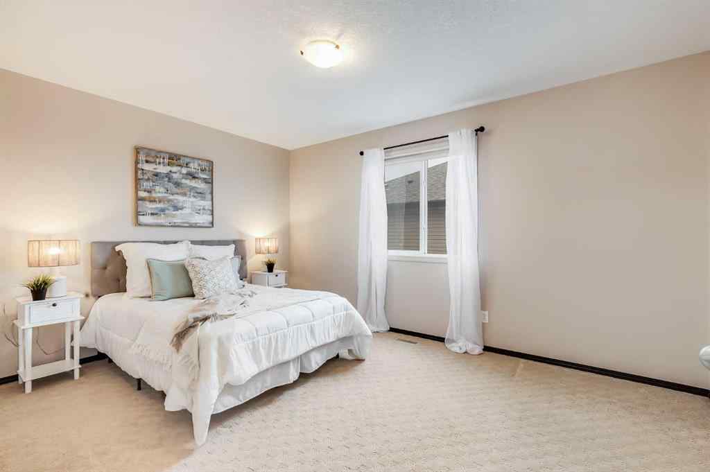 MLS® A2268880 - 1465 Kings Heights Boulevard SE in Kings Heights Airdrie, Residential