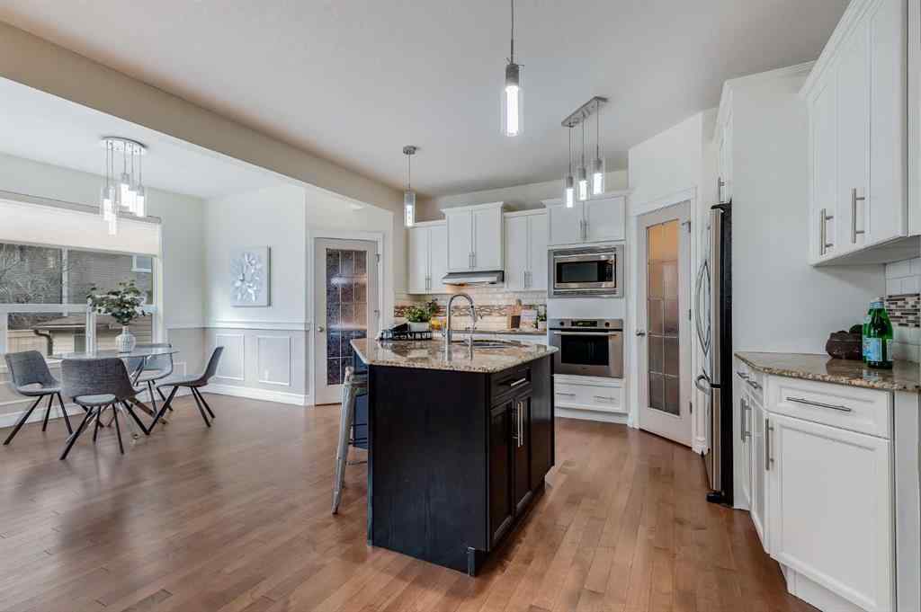 MLS® A2268880 - 1465 Kings Heights Boulevard SE in Kings Heights Airdrie, Residential