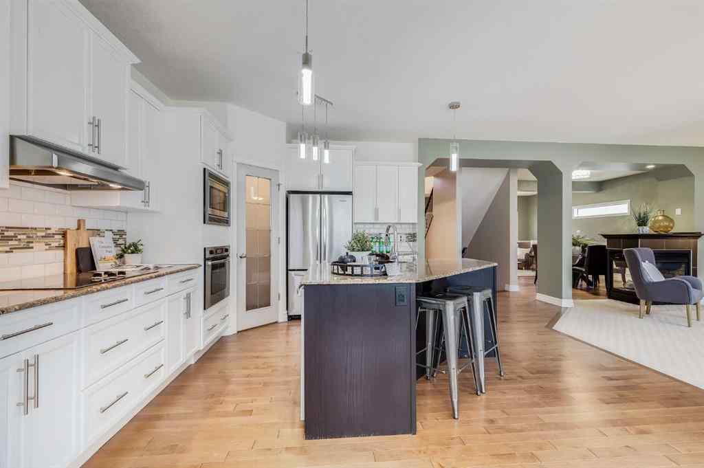 MLS® A2268880 - 1465 Kings Heights Boulevard SE in Kings Heights Airdrie, Residential