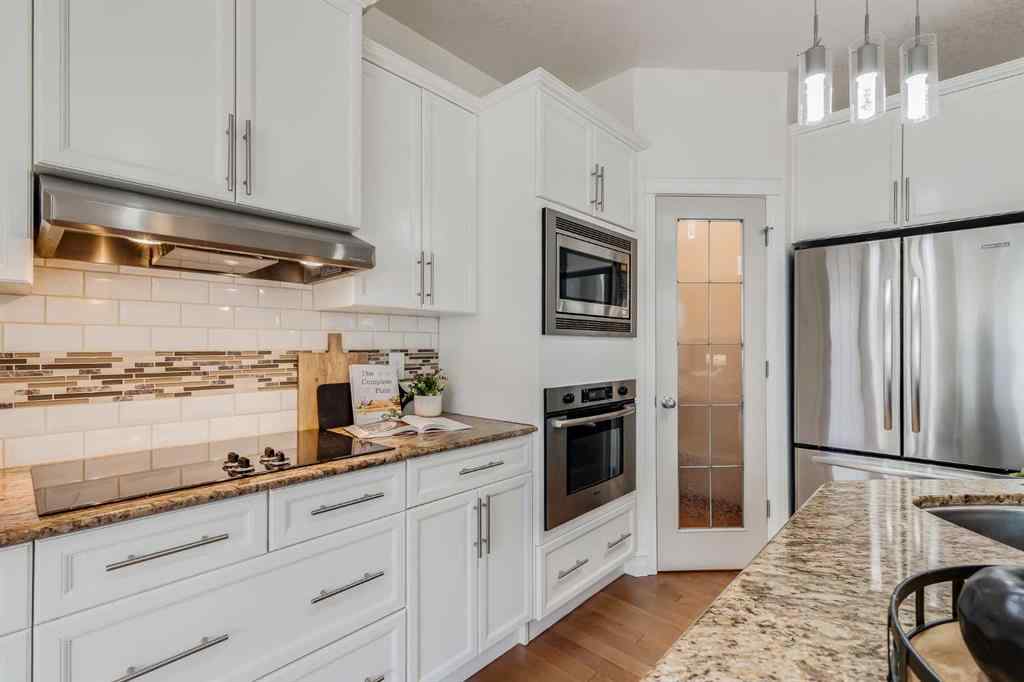 MLS® A2268880 - 1465 Kings Heights Boulevard SE in Kings Heights Airdrie, Residential