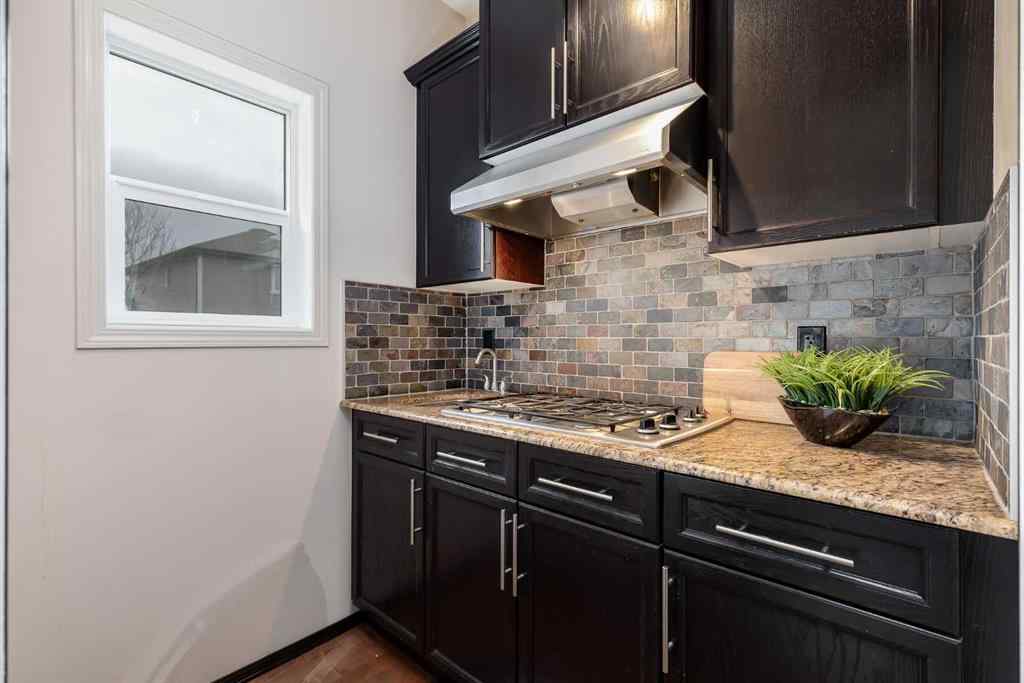 MLS® A2268880 - 1465 Kings Heights Boulevard SE in Kings Heights Airdrie, Residential