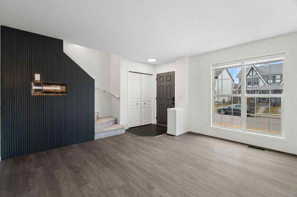 MLS® A2268888 - 211 Elgin Meadows Gardens SE in McKenzie Towne Calgary, Residential