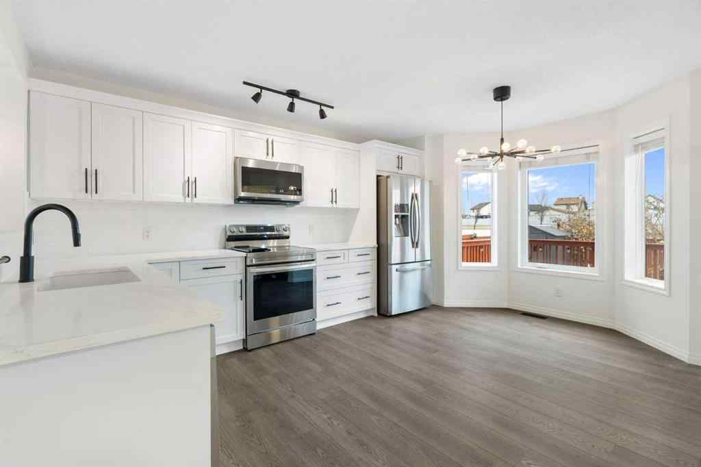 MLS® A2268888 - 211 Elgin Meadows Gardens SE in McKenzie Towne Calgary, Residential