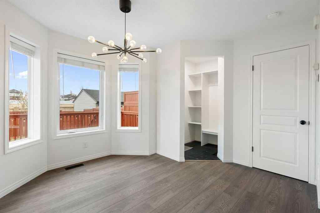 MLS® A2268888 - 211 Elgin Meadows Gardens SE in McKenzie Towne Calgary, Residential