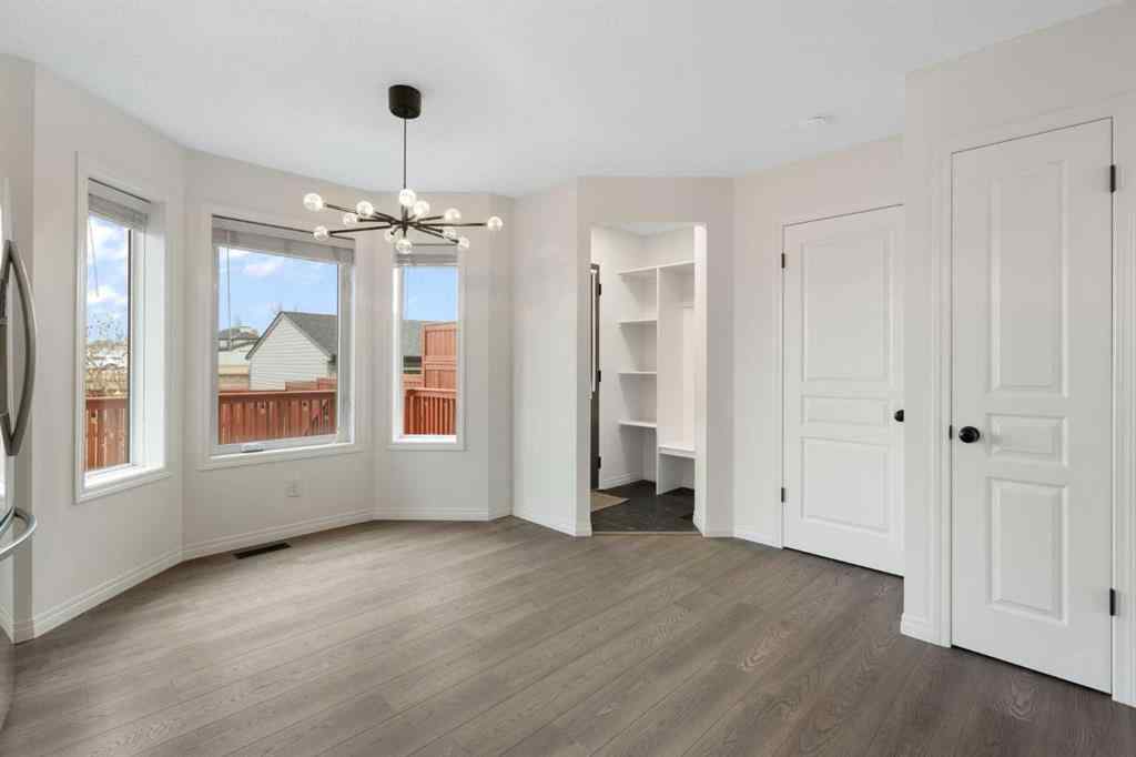 MLS® A2268888 - 211 Elgin Meadows Gardens SE in McKenzie Towne Calgary, Residential