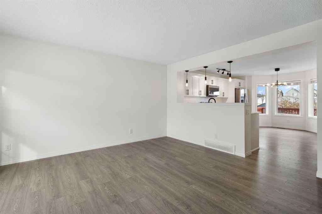 MLS® A2268888 - 211 Elgin Meadows Gardens SE in McKenzie Towne Calgary, Residential