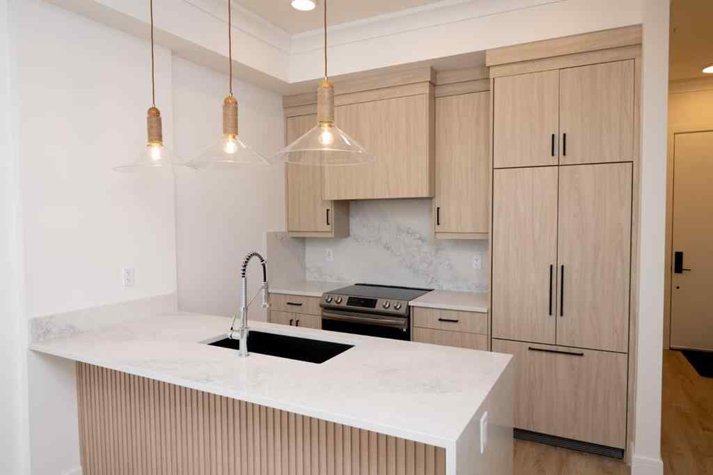 MLS® A2268889 - Unit #414 330 Dieppe Drive SW in Currie Barracks Calgary, Residential