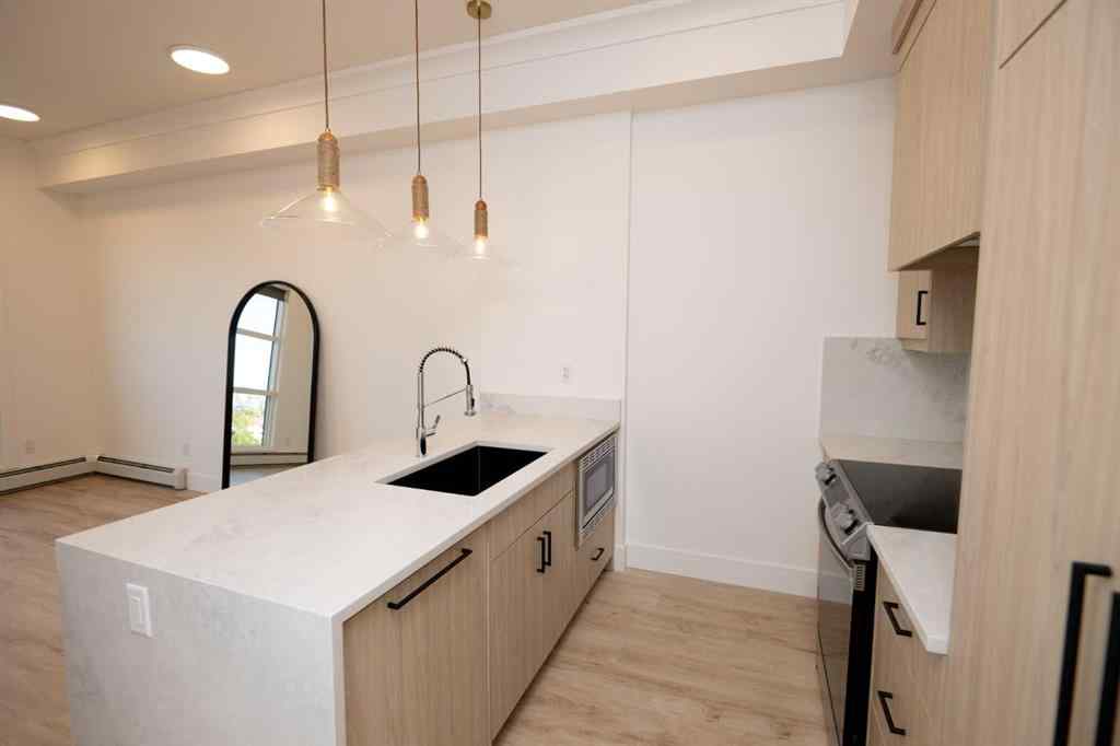 MLS® A2268889 - Unit #414 330 Dieppe Drive SW in Currie Barracks Calgary, Residential