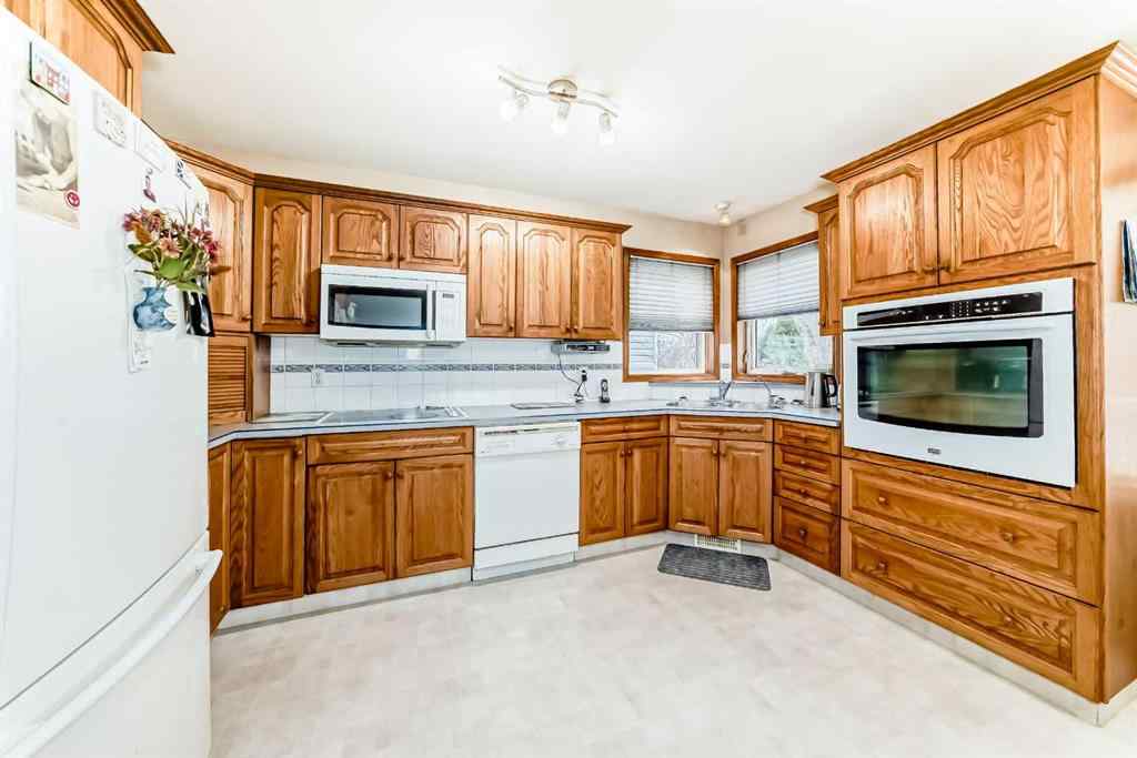 MLS&reg; # A2268896 - 49 Kingston Drive  in Kentwood East Red Deer, Residential Open Houses