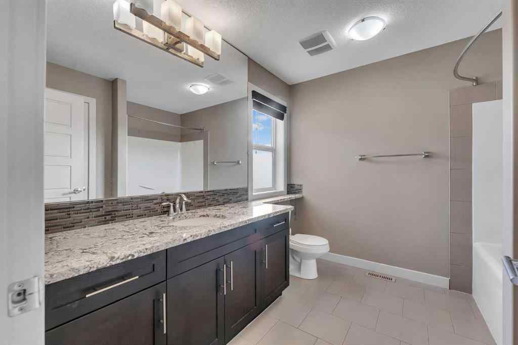 MLS® A2268934 - 204 Sunset View  in Sunset Ridge Cochrane, Residential