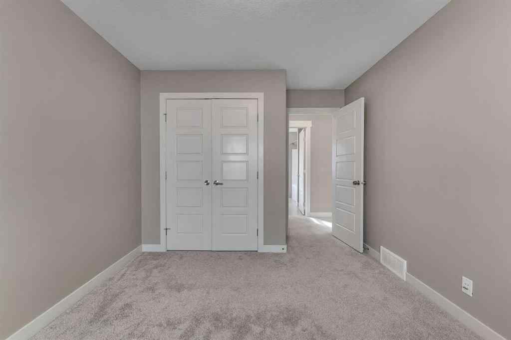 MLS® A2268934 - 204 Sunset View  in Sunset Ridge Cochrane, Residential