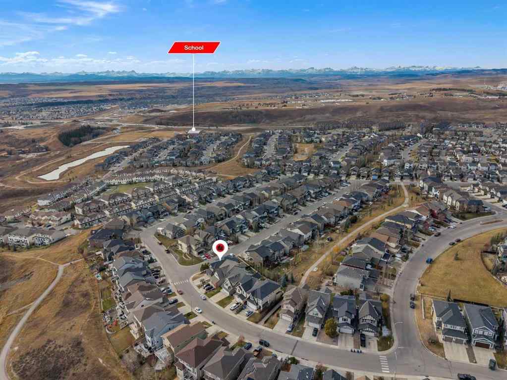 MLS® A2268934 - 204 Sunset View  in Sunset Ridge Cochrane, Residential