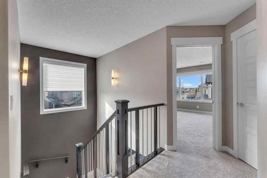 MLS® A2268934 - 204 Sunset View  in Sunset Ridge Cochrane, Residential