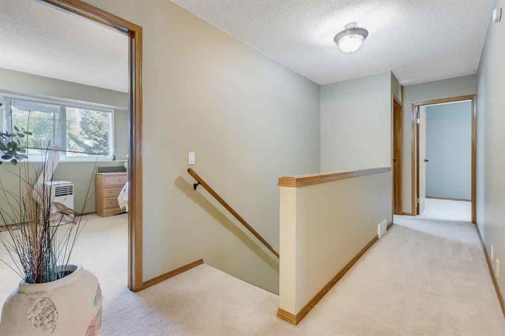 MLS® A2268942 - 212 Mckerrell Way SE in McKenzie Lake Calgary, Residential