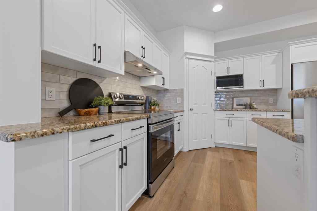 MLS® A2268944 - 97 Cresthaven Way SW in Crestmont Calgary, Residential