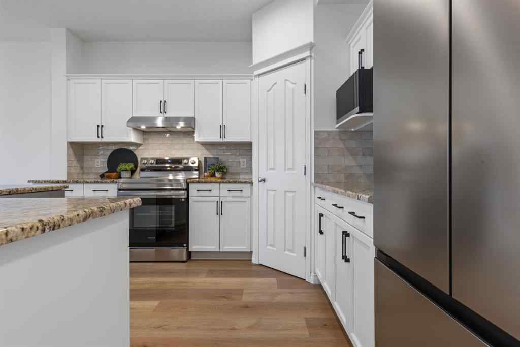 MLS® A2268944 - 97 Cresthaven Way SW in Crestmont Calgary, Residential