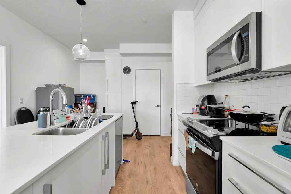 MLS® A2268959 - Unit #1415 111 Wolf Creek Drive SE in Wolf Willow Calgary, Residential