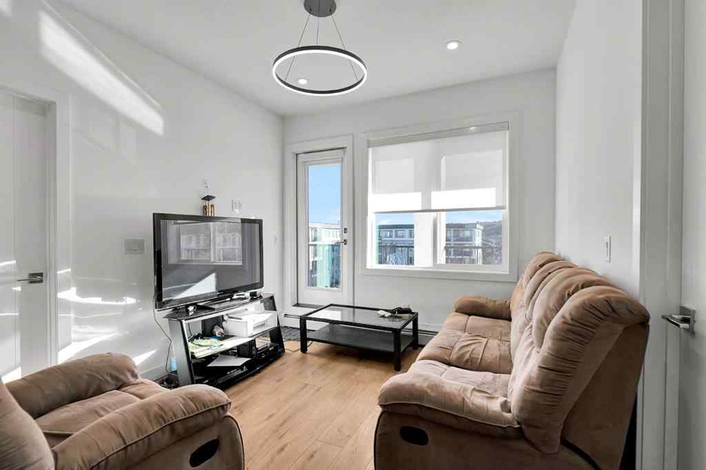 MLS® A2268959 - Unit #1415 111 Wolf Creek Drive SE in Wolf Willow Calgary, Residential