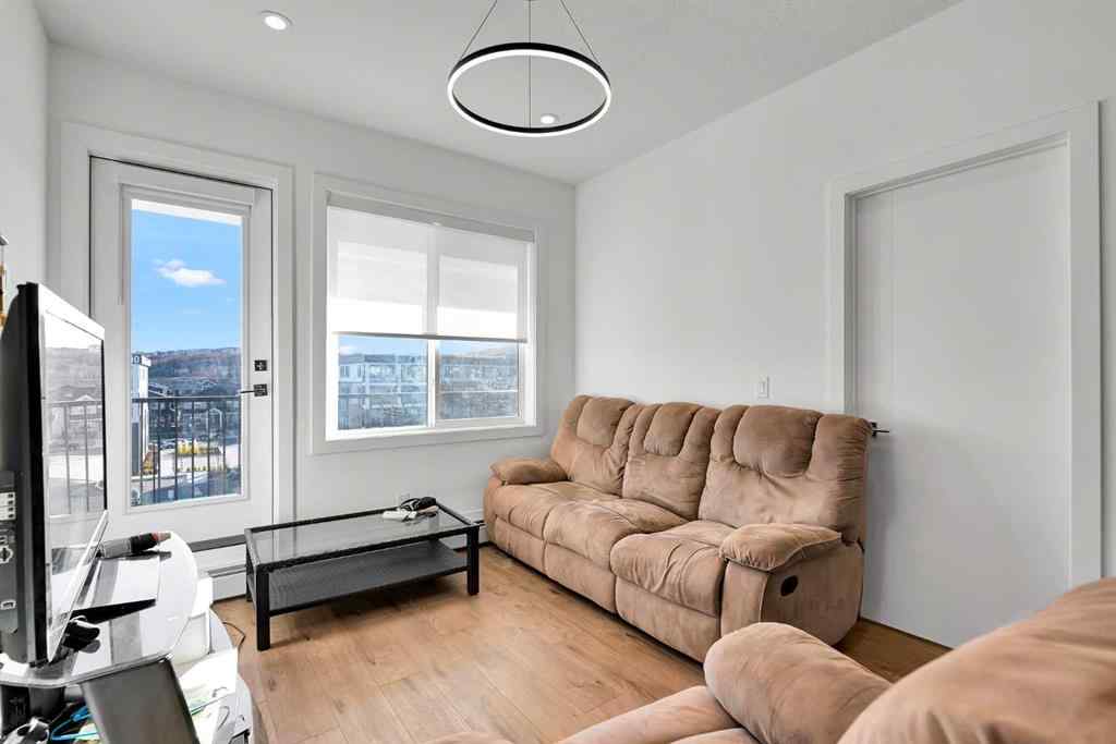 MLS® A2268959 - Unit #1415 111 Wolf Creek Drive SE in Wolf Willow Calgary, Residential