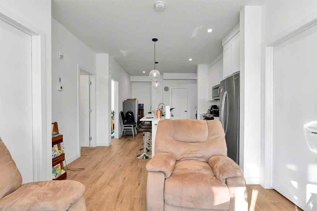 MLS® A2268959 - Unit #1415 111 Wolf Creek Drive SE in Wolf Willow Calgary, Residential