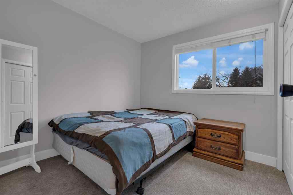MLS® A2268973 - 28 Woodglen Close SW in Woodbine Calgary, Residential