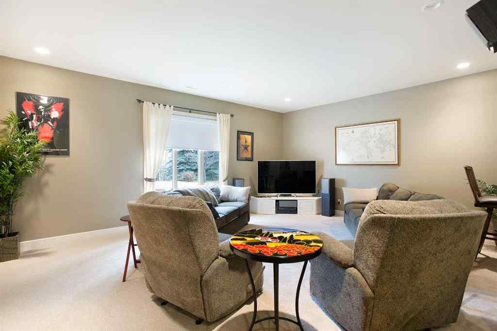 MLS® A2268978 - 311 Rodeo Ridge  in Springbank Links Rural Rocky View County, Residential