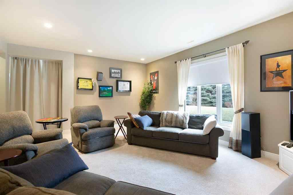 MLS® A2268978 - 311 Rodeo Ridge  in Springbank Links Rural Rocky View County, Residential