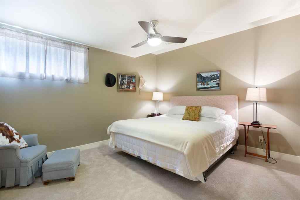 MLS® A2268978 - 311 Rodeo Ridge  in Springbank Links Rural Rocky View County, Residential